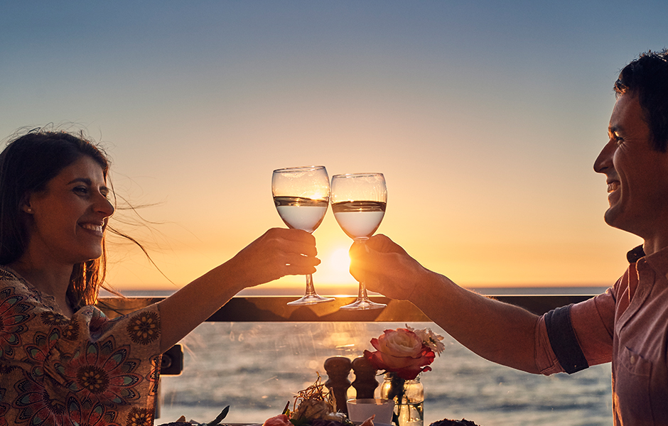 Woman and Man Cheers Wine Glasses